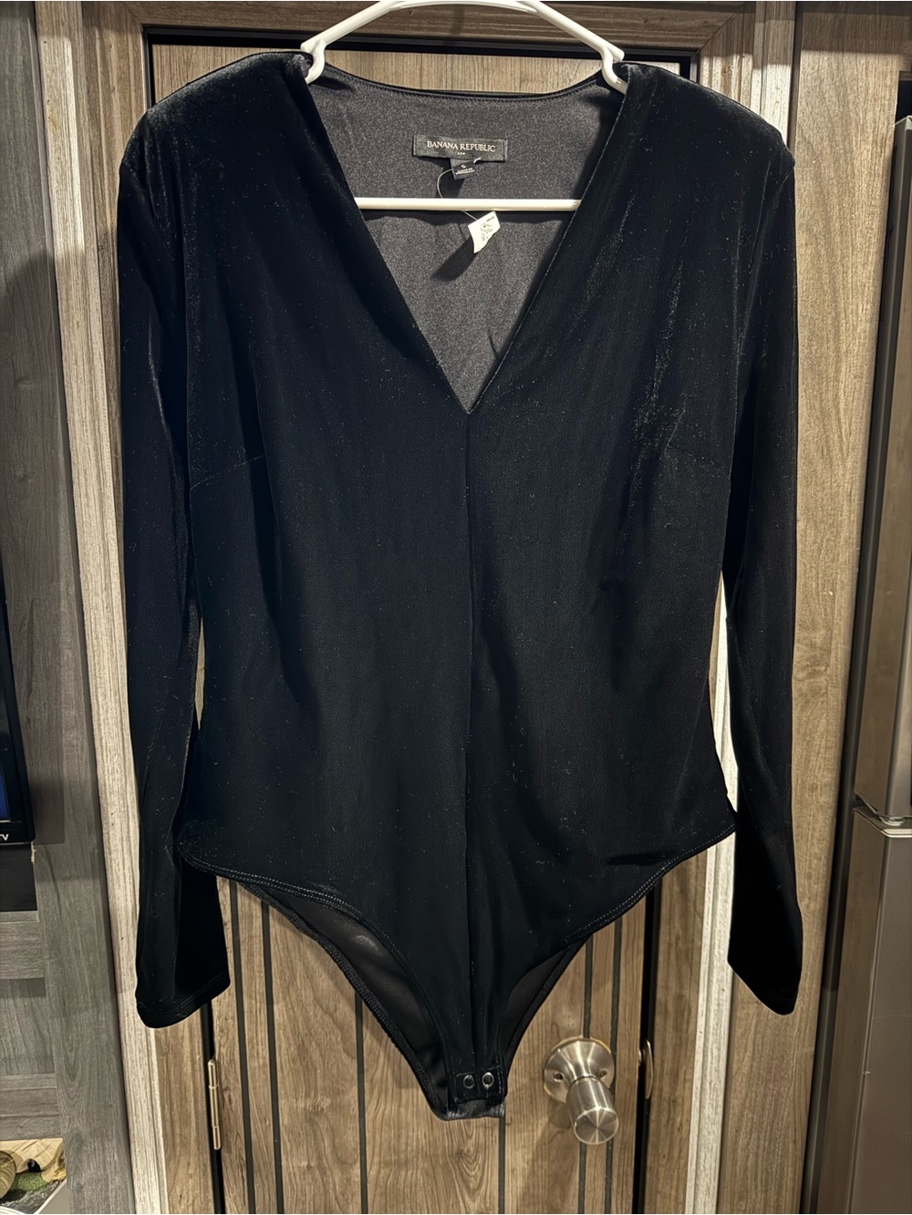 Banana Republic Black Velvet V-Neck Long Sleeve Bodysuit. Shoulder pads.